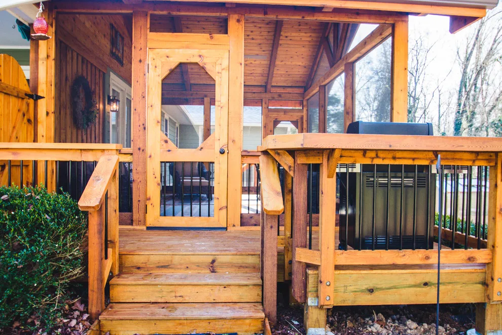 Englewood Cedar screened room with visible beams by Smoky Mountain Deck Builders - Photo 13
