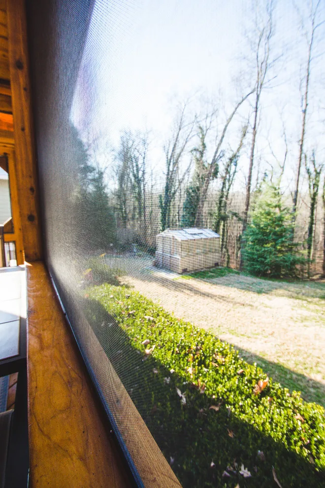 Englewood Cedar screened room with visible beams by Smoky Mountain Deck Builders - Photo 6