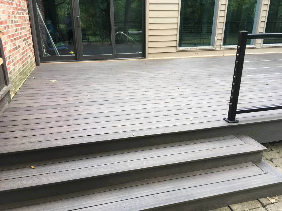 Feeney Cable Railing with Deckorators Composite Decking by Unique Deck Builders - Photo 7
