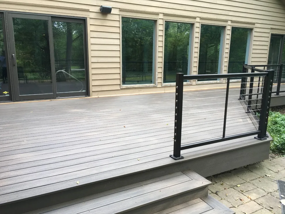 Feeney Cable Railing with Deckorators Composite Decking by Unique Deck Builders - Photo 2