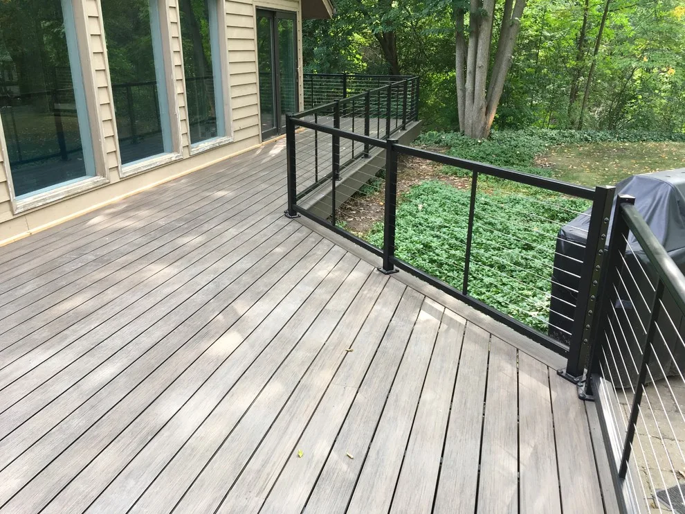Feeney Cable Railing with Deckorators Composite Decking by Unique Deck Builders - Photo 5