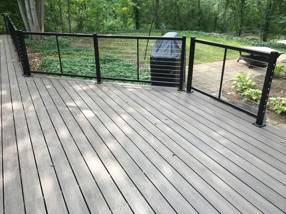 Feeney Cable Railing with Deckorators Composite Decking by Unique Deck Builders - Photo 8