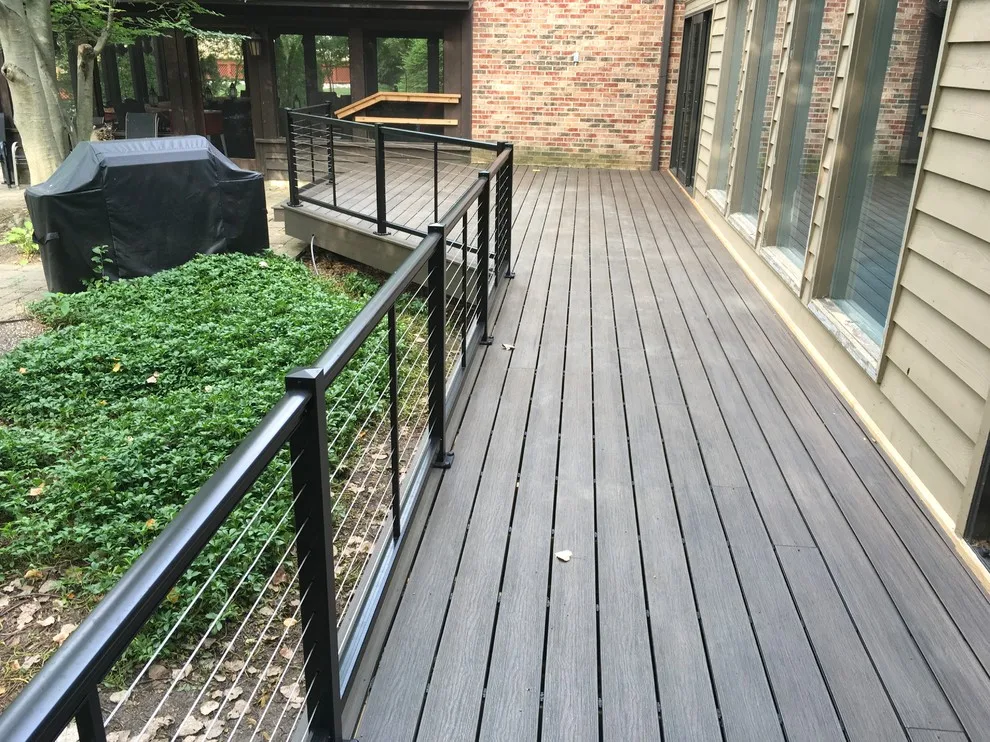 Feeney Cable Railing with Deckorators Composite Decking by Unique Deck Builders - Photo 3