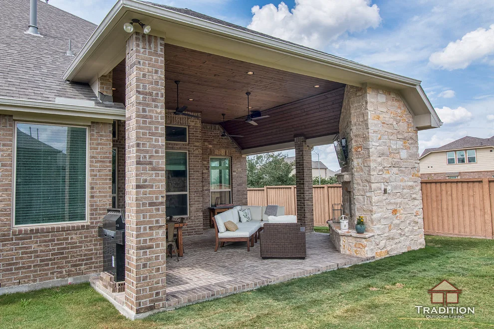 Elevated Patio Featuring Stone Fireplace in Katy, TX by Tradition Outdoor Living - Photo 2