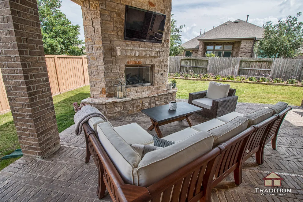 Elevated Patio Featuring Stone Fireplace in Katy, TX by Tradition Outdoor Living - Photo 9