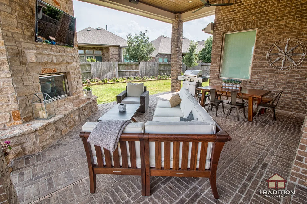 Elevated Patio Featuring Stone Fireplace in Katy, TX by Tradition Outdoor Living - Photo 4