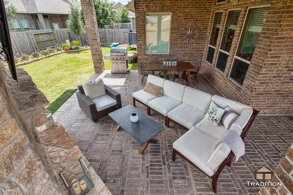 Elevated Patio Featuring Stone Fireplace in Katy, TX by Tradition Outdoor Living - Photo 13