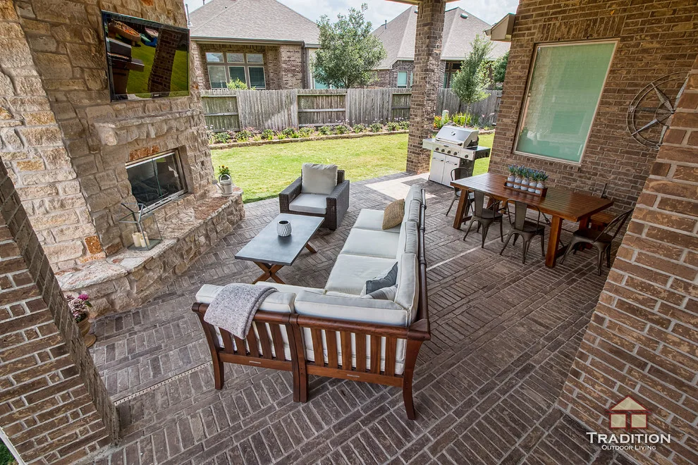 Elevated Patio Featuring Stone Fireplace in Katy, TX by Tradition Outdoor Living - Photo 7