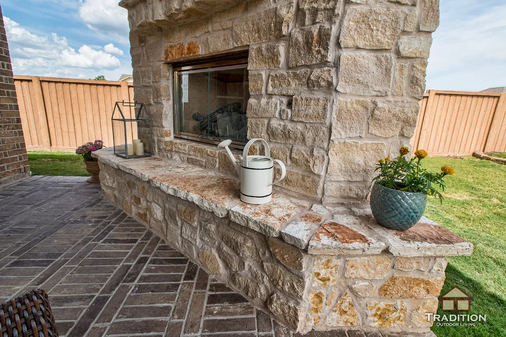 Elevated Patio Featuring Stone Fireplace in Katy, TX by Tradition Outdoor Living - Photo 6
