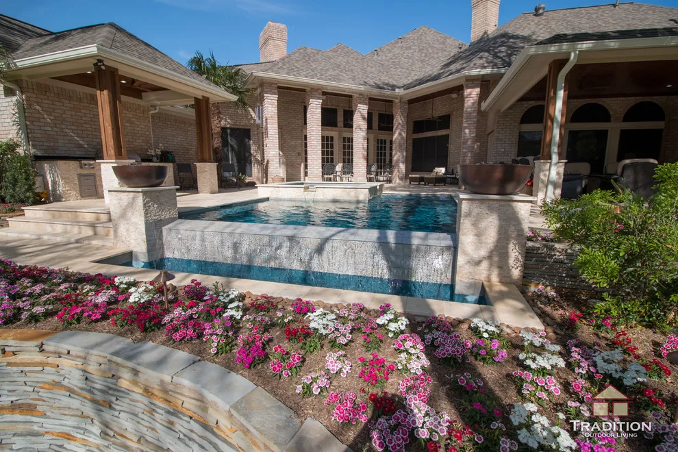 Outdoor Space Featuring Infinity Pool and Stone Steps by Tradition Outdoor Living - Photo 6