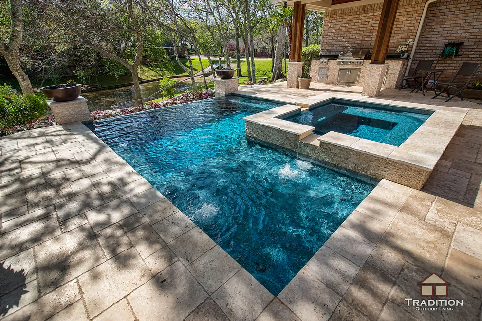 Outdoor Space Featuring Infinity Pool and Stone Steps by Tradition Outdoor Living - Photo 3