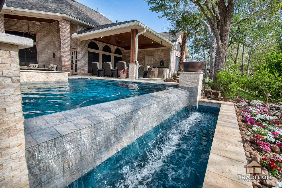 Outdoor Space Featuring Infinity Pool and Stone Steps by Tradition Outdoor Living - Photo 9