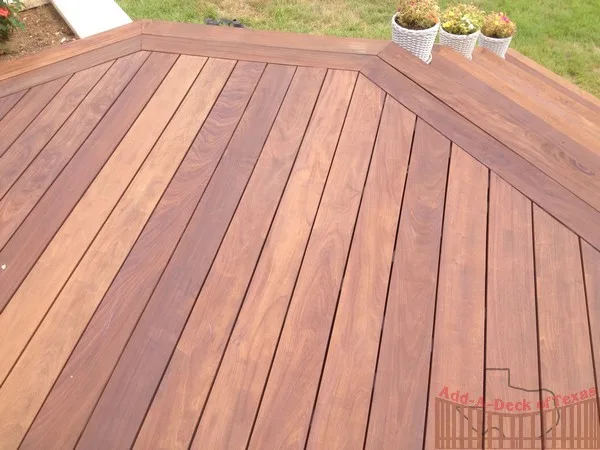 Ipe Wood Deck with Metal Support and Limestone Planters Surrounding Deck by Austin Add-A-Deck - Photo 8
