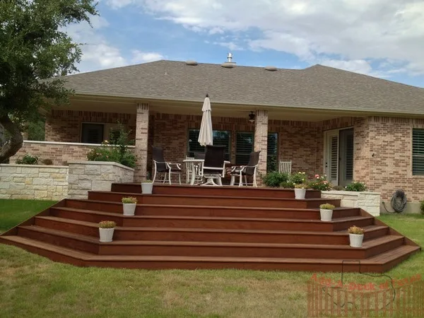 Ipe Wood Deck with Metal Support and Limestone Planters Surrounding Deck by Austin Add-A-Deck - Photo 5