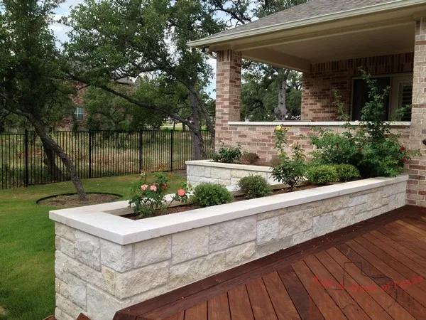 Ipe Wood Deck with Metal Support and Limestone Planters Surrounding Deck by Austin Add-A-Deck - Photo 9