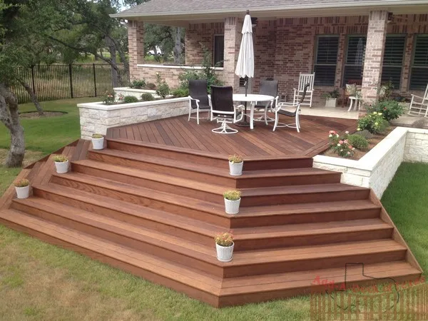 Ipe Wood Deck with Metal Support and Limestone Planters Surrounding Deck by Austin Add-A-Deck - Photo 6