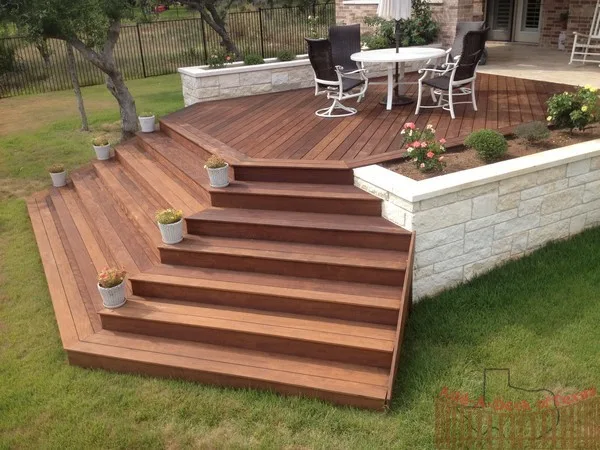Ipe Wood Deck with Metal Support and Limestone Planters Surrounding Deck by Austin Add-A-Deck - Photo 3