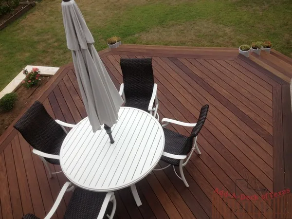 Ipe Wood Deck with Metal Support and Limestone Planters Surrounding Deck by Austin Add-A-Deck - Photo 7