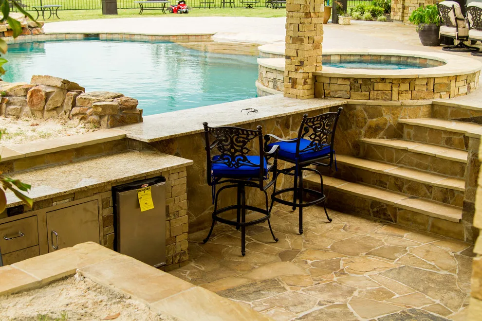 Outdoor Kitchen by the Pool by HomeScapes - Photo 3