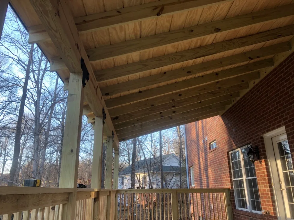 L-shaped sheltered patio by Epoch Construction LLC - Photo 2
