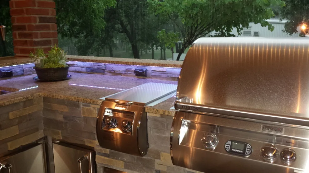 L-Shaped Outdoor Kitchen Featuring Distinctive Lighting by Big Ridge Outdoor Kitchens, LLC - Photo 22