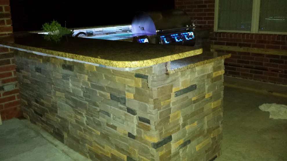 L-Shaped Outdoor Kitchen Featuring Distinctive Lighting by Big Ridge Outdoor Kitchens, LLC - Photo 4