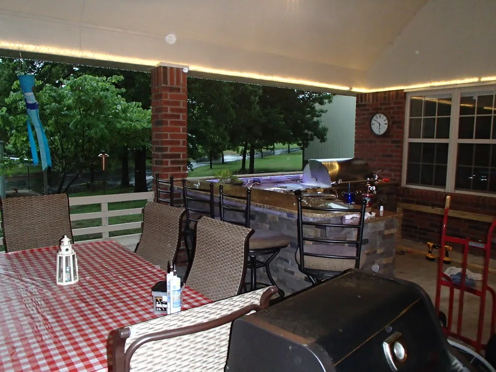 L-Shaped Outdoor Kitchen Featuring Distinctive Lighting by Big Ridge Outdoor Kitchens, LLC - Photo 3