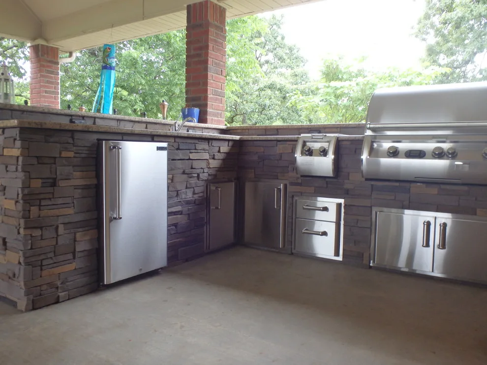 L-Shaped Outdoor Kitchen Featuring Distinctive Lighting by Big Ridge Outdoor Kitchens, LLC - Photo 16