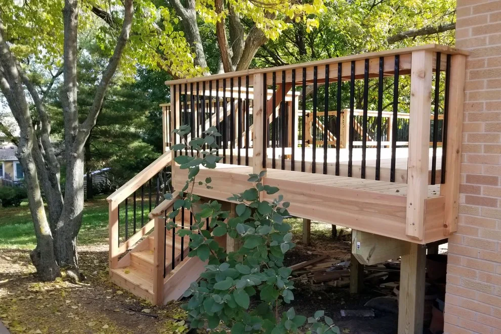 Spacious Cedar Deck on Brick Home by Deck & Drive Solutions - Photo 8