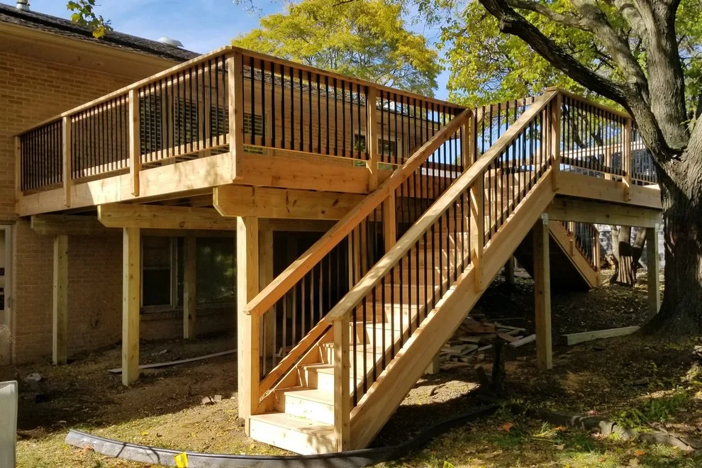 Spacious Cedar Deck on Brick Home by Deck & Drive Solutions - Photo 4
