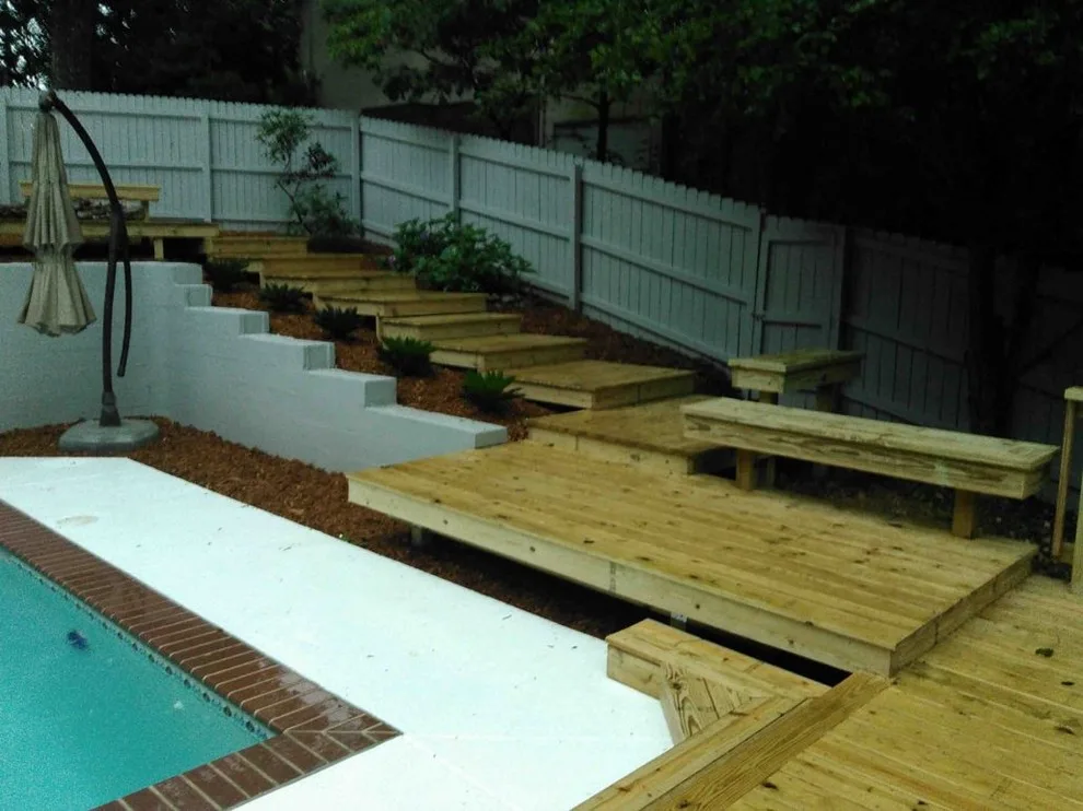 Expansive Tailored Pool Deck by Decks On A Budget - Photo 6