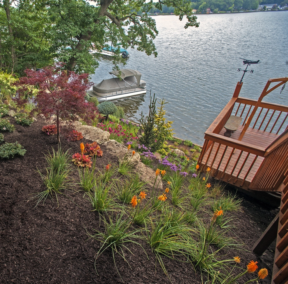 Lakeside slopes in Valparaiso, Indiana by Smalls Landscaping - Photo 10