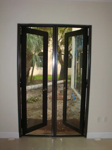 Retractable French Door Screens with Manual Operation by Sentinel Retractable Screens, LLC - Photo 7