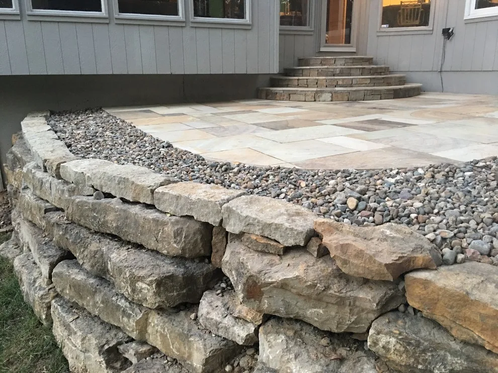 Missouri Patios with Fire Pit, Integrated Steps, and Outdoor Lighting by Kansas City Hardscapes - Photo 9