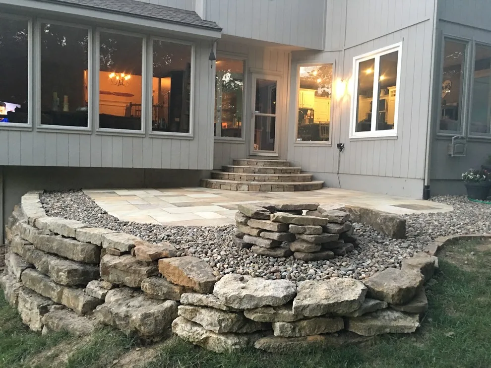 Missouri Patios with Fire Pit, Integrated Steps, and Outdoor Lighting by Kansas City Hardscapes - Photo 14