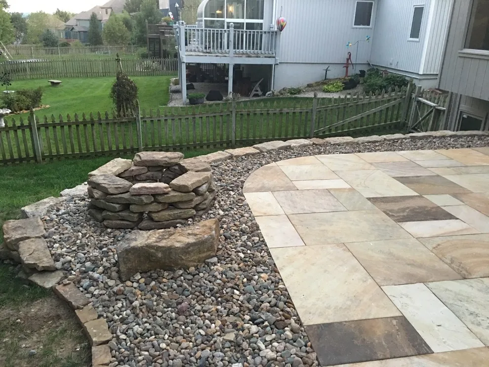 Missouri Patios with Fire Pit, Integrated Steps, and Outdoor Lighting by Kansas City Hardscapes - Photo 5