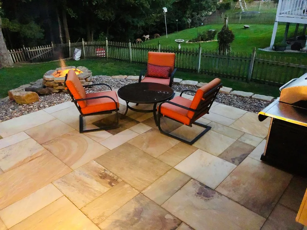 Missouri Patios with Fire Pit, Integrated Steps, and Outdoor Lighting by Kansas City Hardscapes - Photo 6