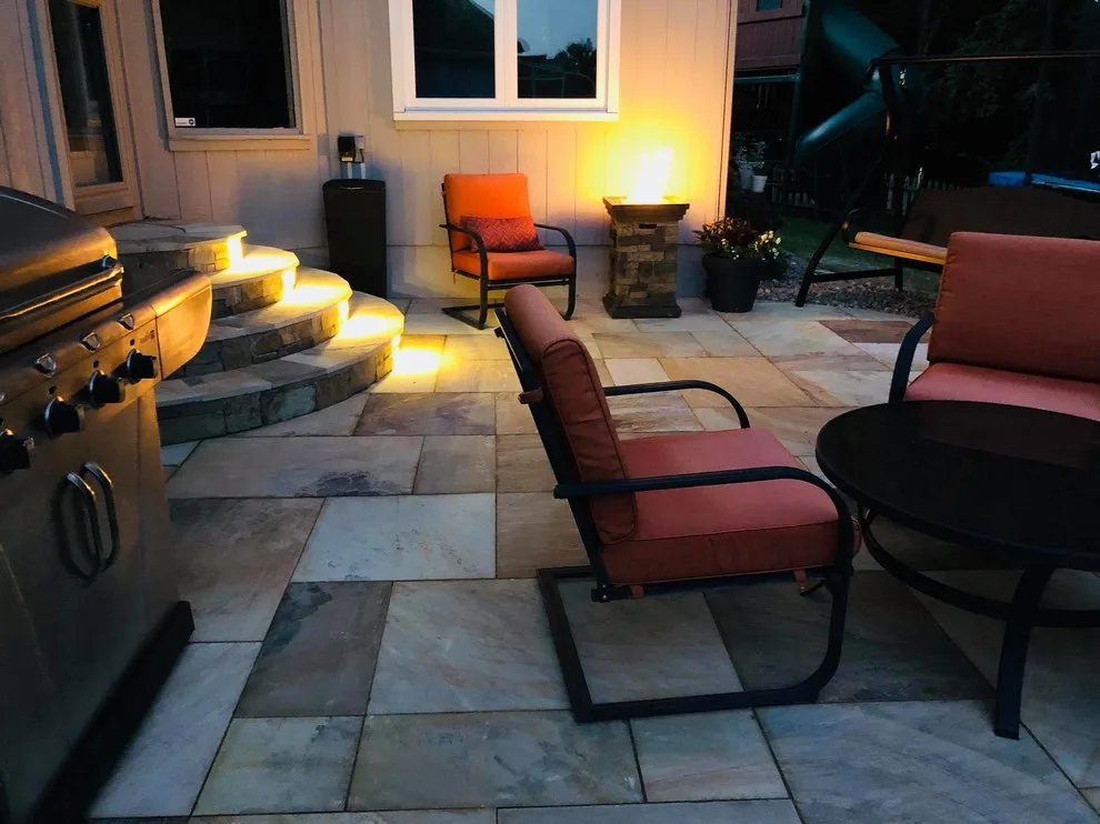 Missouri Patios with Fire Pit, Integrated Steps, and Outdoor Lighting by Kansas City Hardscapes - Photo 7