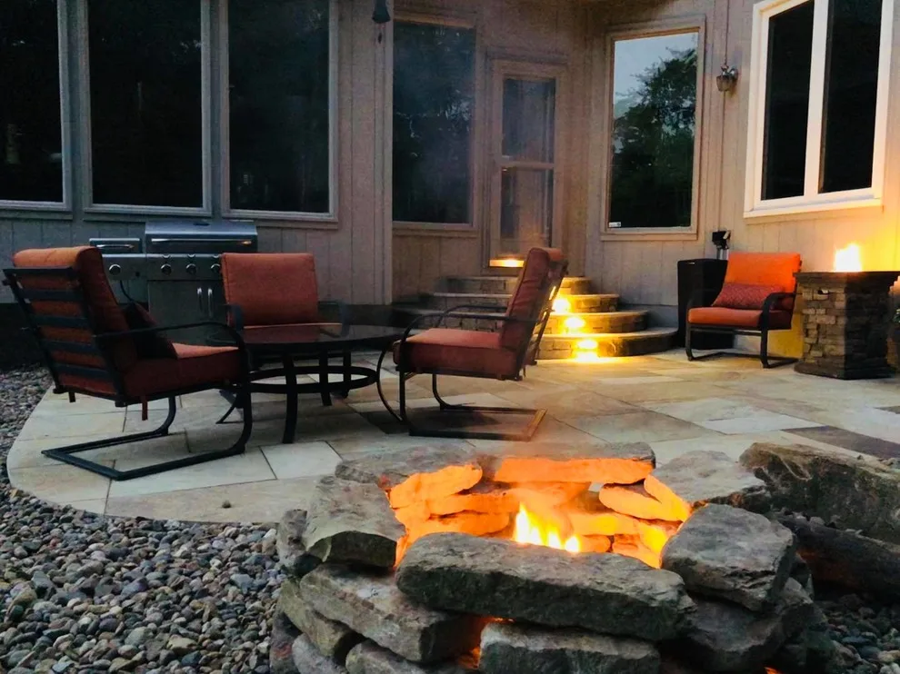 Missouri Patios with Fire Pit, Integrated Steps, and Outdoor Lighting by Kansas City Hardscapes - Photo 2