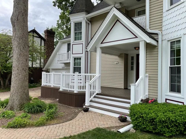 Mocha TimberTech Deck with White Radiance Railings in Wheaton, IL by Archadeck Of Chicagoland - Photo 3