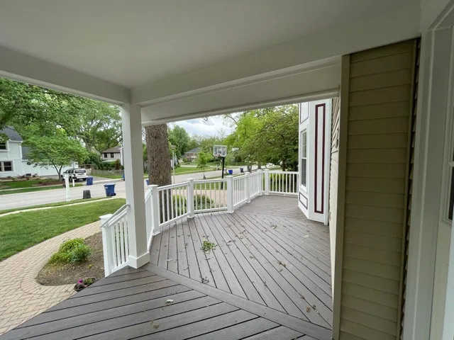 Mocha TimberTech Deck with White Radiance Railings in Wheaton, IL by Archadeck Of Chicagoland - Photo 4