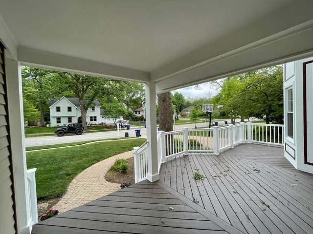 Mocha TimberTech Deck with White Radiance Railings in Wheaton, IL by Archadeck Of Chicagoland - Photo 5