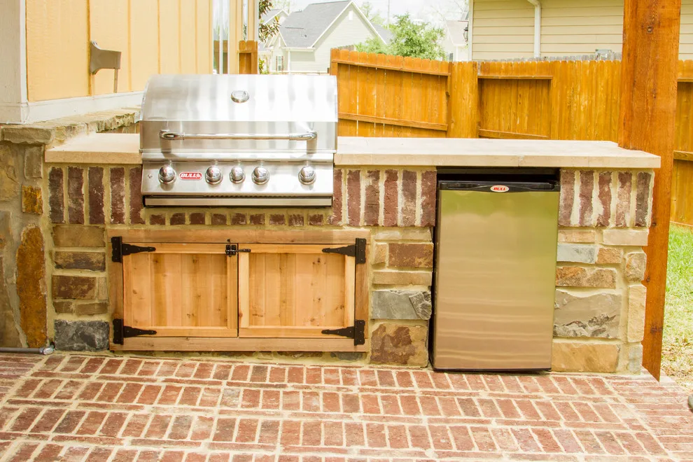 Outdoor Kitchen with Brick and Stone by HomeScapes - Photo 2