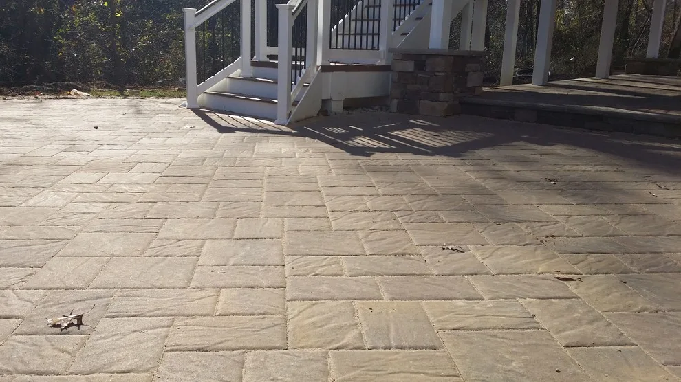 Tiered patio adjacent to Fiberon ipe deck by Coastal Outdoor Spaces - Photo 13