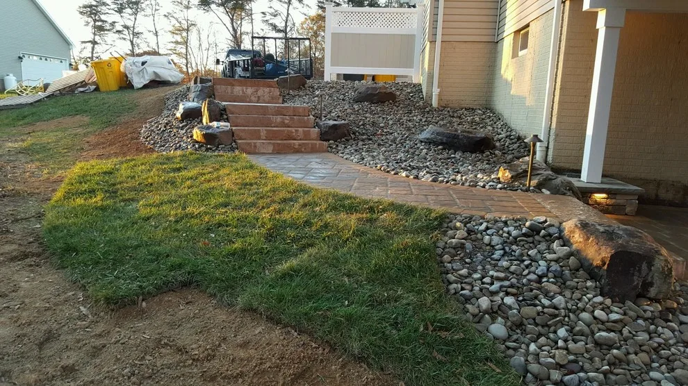 Tiered patio adjacent to Fiberon ipe deck by Coastal Outdoor Spaces - Photo 10