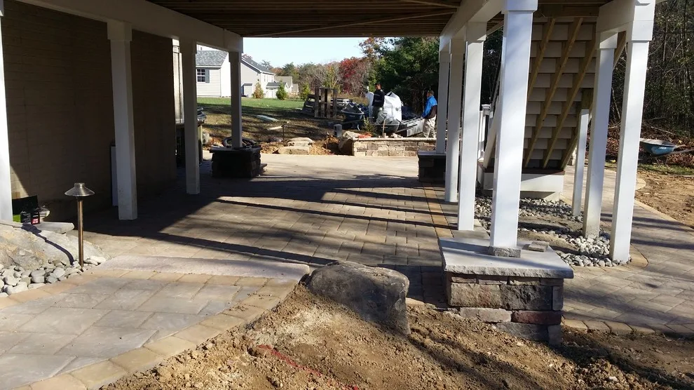 Tiered patio adjacent to Fiberon ipe deck by Coastal Outdoor Spaces - Photo 17