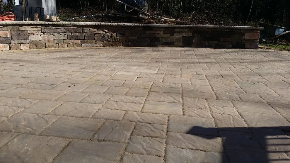 Tiered patio adjacent to Fiberon ipe deck by Coastal Outdoor Spaces - Photo 9