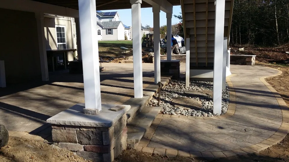 Tiered patio adjacent to Fiberon ipe deck by Coastal Outdoor Spaces - Photo 11
