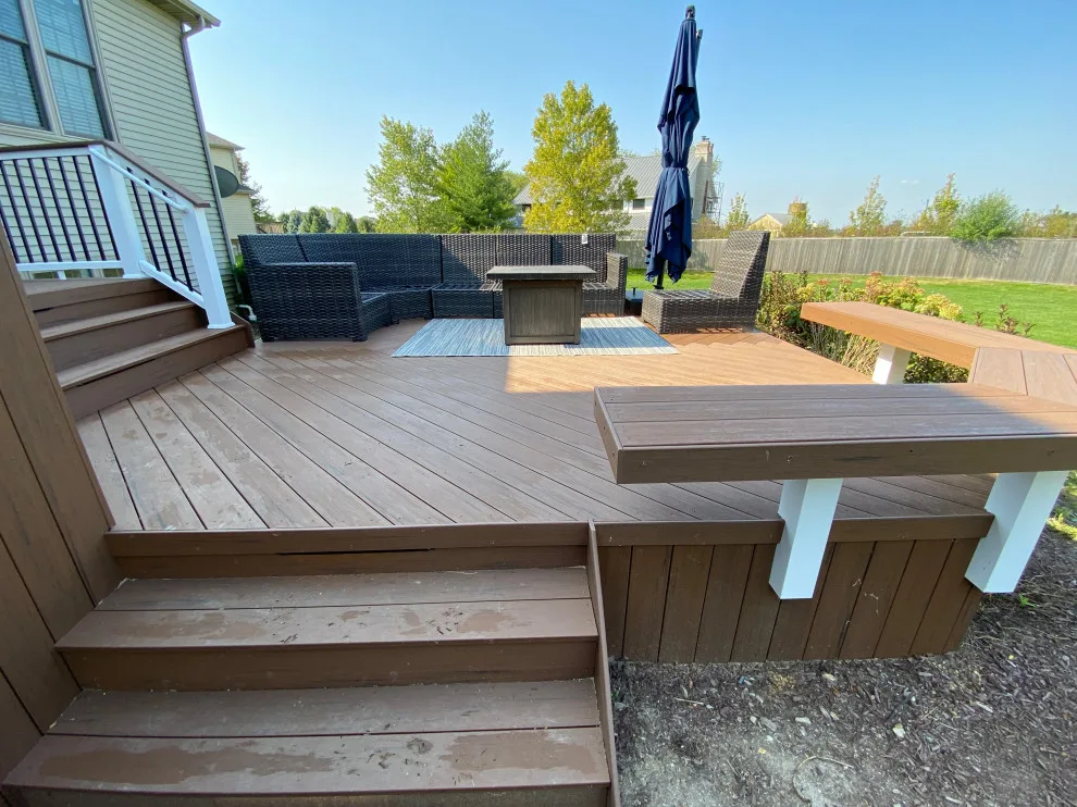 Rustic Elm Multi-level TimberTech Deck with Floating Bench in Naperville, IL by Archadeck Of Chicagoland - Photo 2