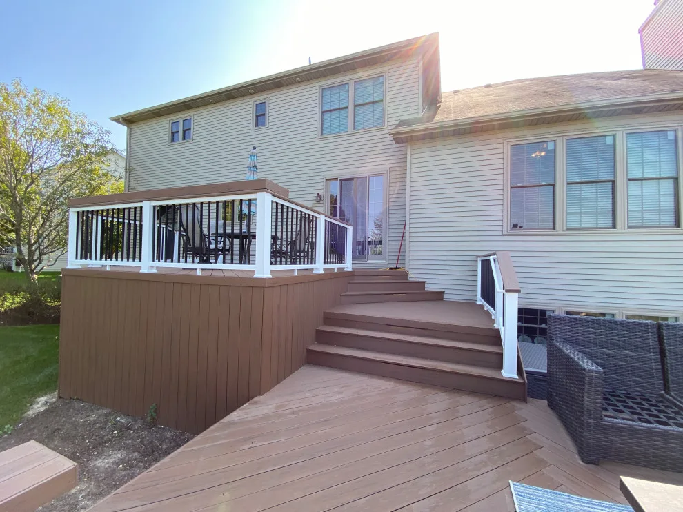 Rustic Elm Multi-level TimberTech Deck with Floating Bench in Naperville, IL by Archadeck Of Chicagoland - Photo 6